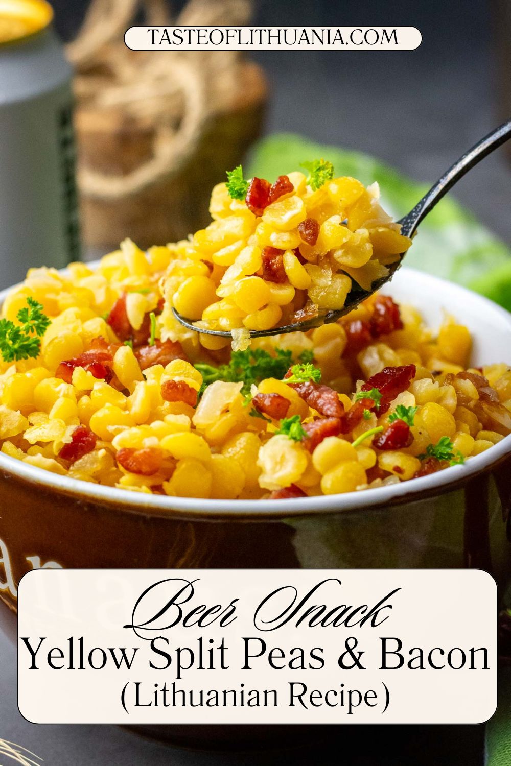 A spoonful of yellow split peas and bacon being take out of a bowl. Pin for Pinterest. 