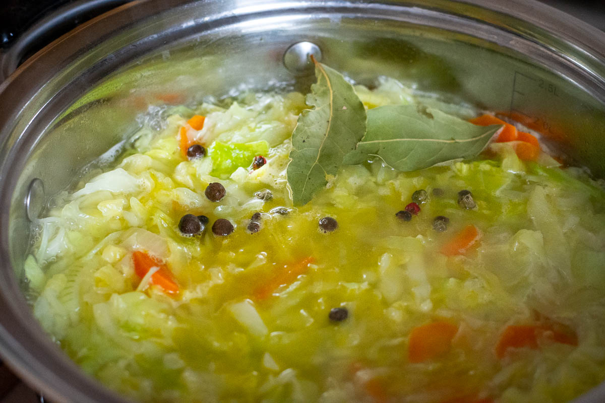 Lithuanian cabbage soup in a large pot.