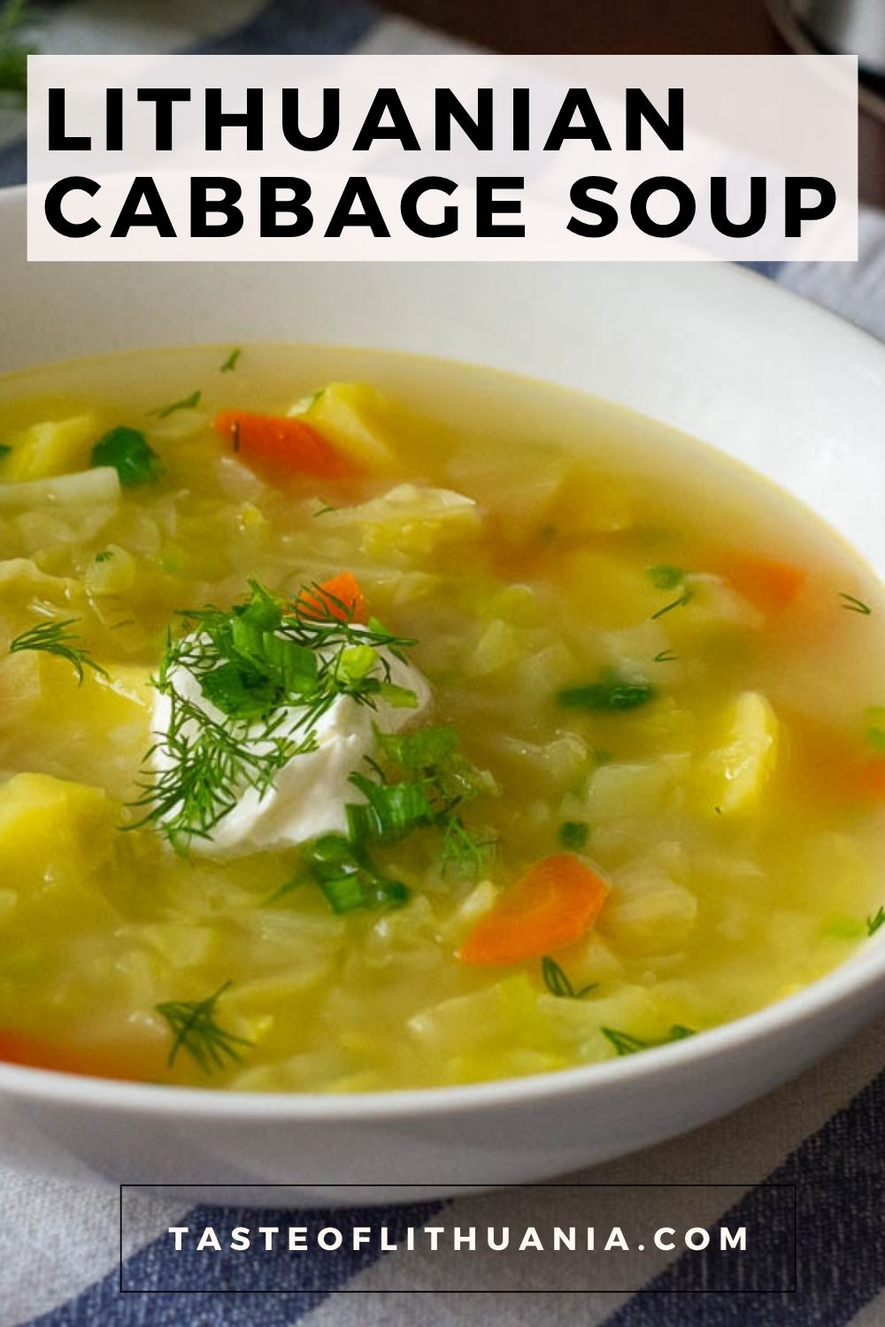 Lithuanian Cabbage Soup With a dollop of sour cream and fresh dill garnish - Pin for Pinterest.