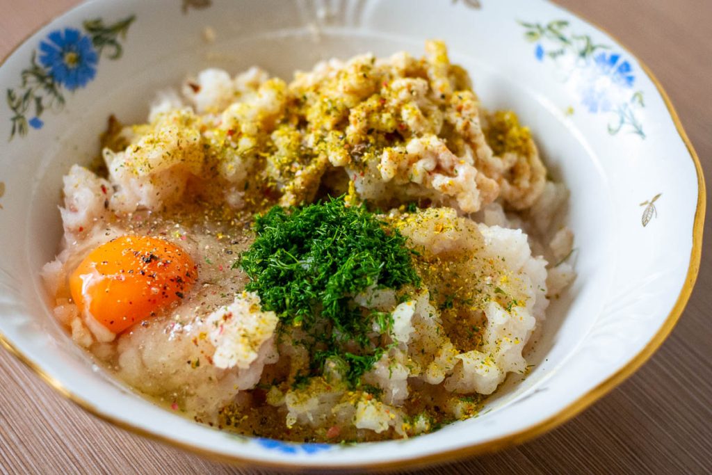 All Lithuanian Fish Cake Ingredients in a large bowl, unmixed.