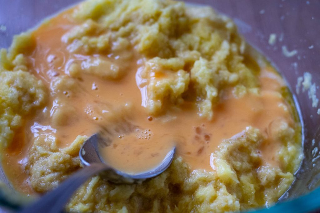 Egg added to the graped potatoes.