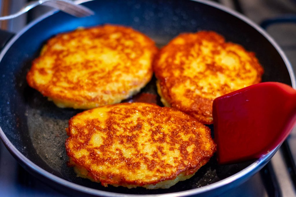 Golden brown and crispy Lithuanian potato pancakes with meat filling.