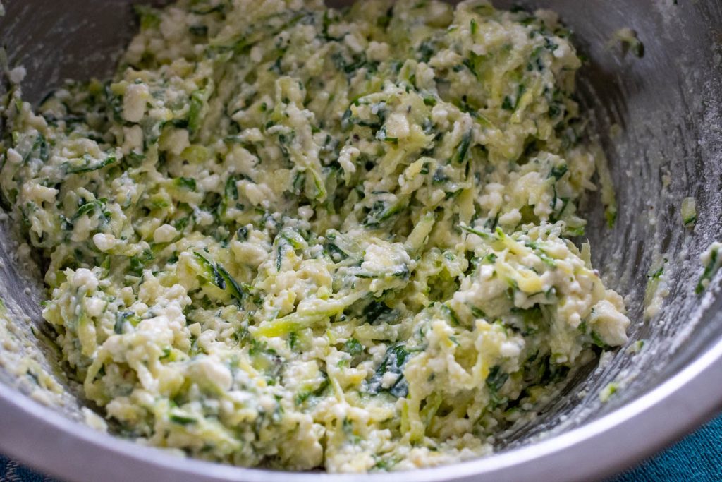 Zucchini Fritter batter in a mixing bowl.