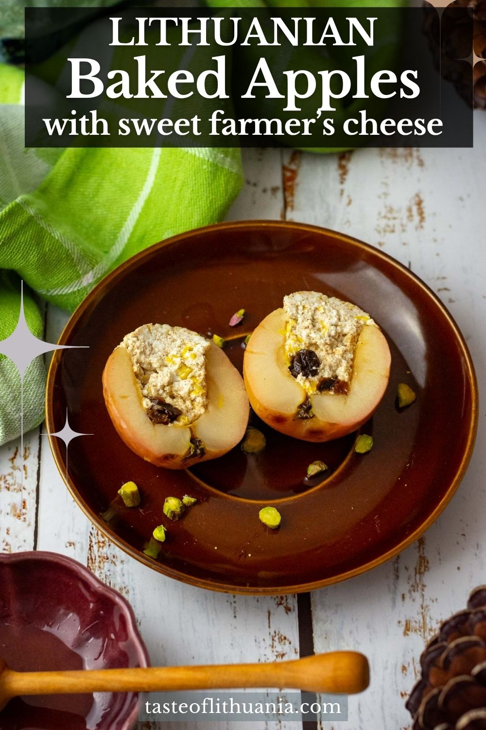 Lithuanian baked apple with farmer's cheese filing cut open on a brown plate. Pin for Pinterest.