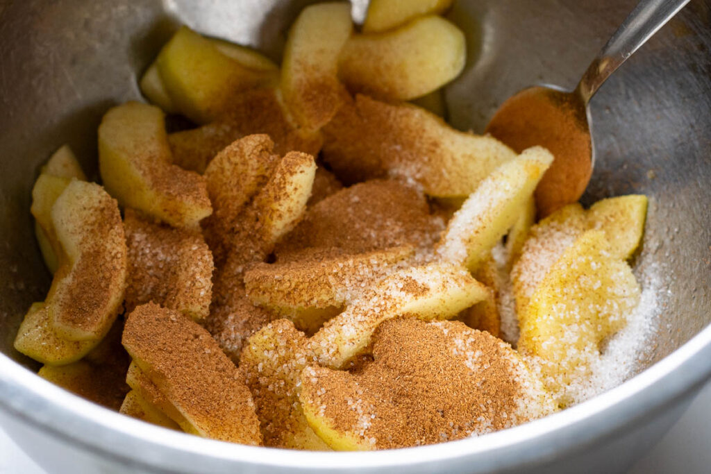 Apple wedges tossed with cinnamon, sugar and honey.