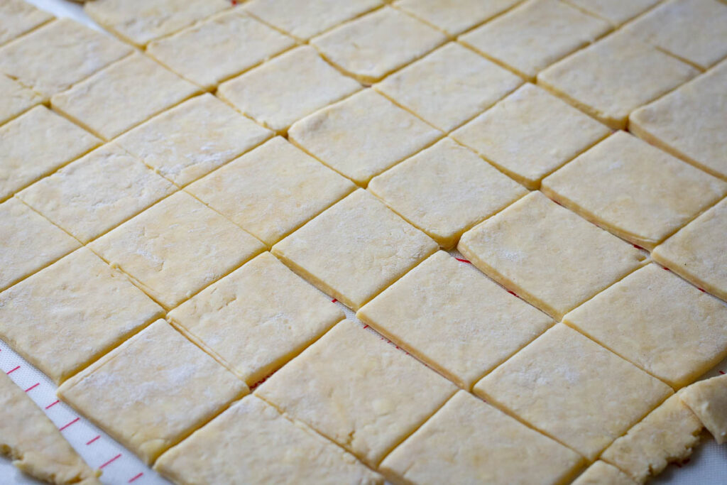 Rolled out pastry cut into squares.
