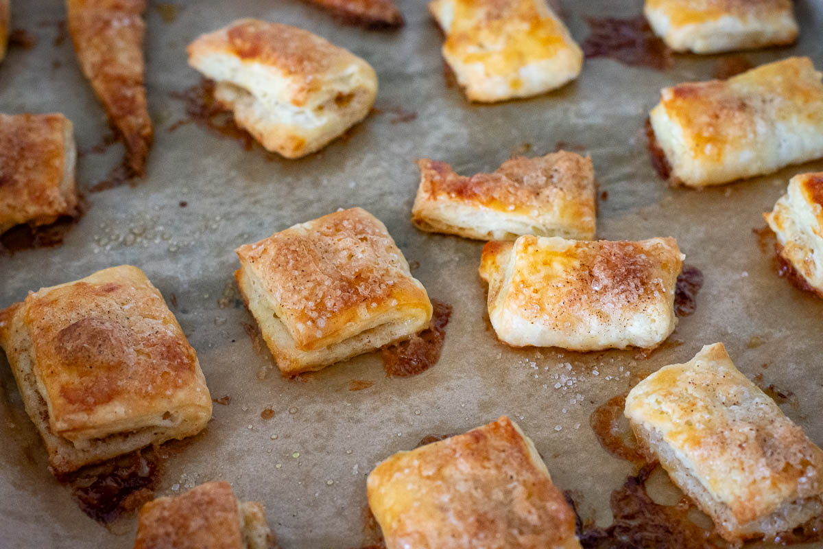 Lithuanian apple cookie dough scraps after baking them in the oven .