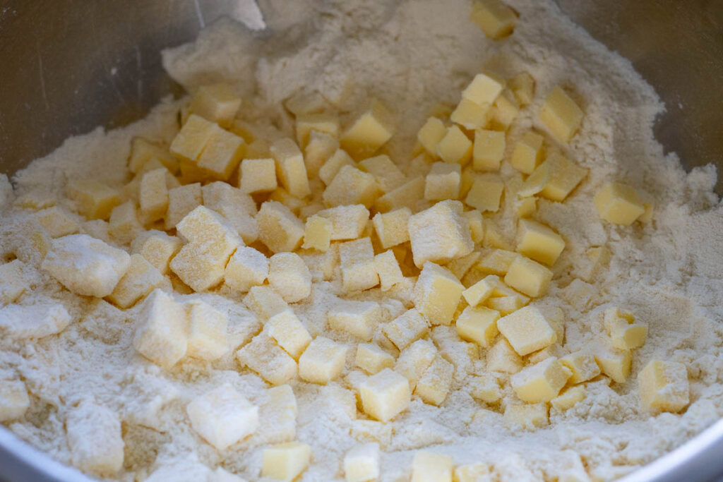Cubed butter added to the four mixture.